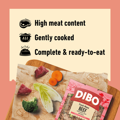 DIBO Fresh dog food packaging with ingredients on a cutting board against a pink background